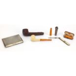 Antique and later objects comprising two 9ct gold mounted amber cheroots, silver cheroot holder,