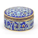 Circular Islamic gilt metal and enamel pot and cover, enamelled with stylised motifs, 4.5cm high x