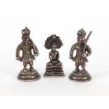 Three unmarked silver figures including one of Buddha, the largest 4cm high, approximate weight 44.