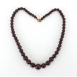 Cherry amber coloured bead necklace, 46cm in length, approximate weight 27.3g : For further