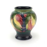 Moorcroft leaf and berry pattern baluster vase, painted factory marks to the base, 15.5cm high : For