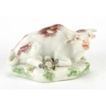 18th century Derby hand painted porcelain cow, paper label to the base, 9cm wide : For further