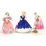 Three Royal Doulton figurines, Queen Victoria HN3125, Figure of The Year Mary HN3375 and