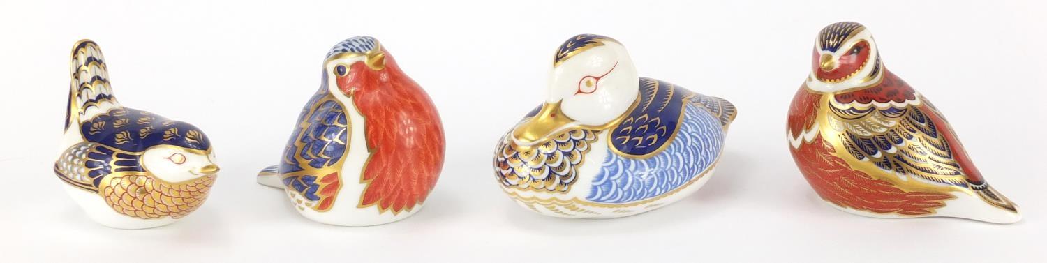 Four Royal Crown Derby bird paperweights, three with gold coloured stoppers, the largest 12cm in