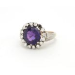 18ct gold diamond and amethyst ring, housed in a A.W Hobcraft box, size G, approximate weight 7.8g :