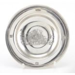 Modern circular silver dish, engraved with a mansion, J.G Ltd Birmingham 1973, 11cm in diameter,