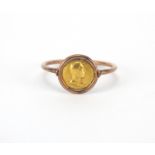 Unmarked gold spinner ring set with a Waterloo coin, size L, the coin 1cm in diameter, approximate