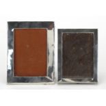 Two miniature silver easel photo frames, Birmingham hallmarks, the largest 11cm x 8.5cm : For