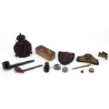 Antique and later objects including Royal Irish Constabulary helmet plate, two pipes, bloodstone