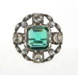 Vintage unmarked white metal green and clear paste brooch, housed in a Collingwood & Co tooled