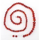 Faceted amber coloured bead necklace, 100cm in length, approximate weight 85.0g : For further