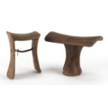 Two African hardwood headrests, the largest 16cm high : For further Condition Reports Please Visit