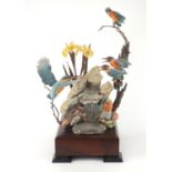 Albany fine china bronze and hand painted porcelain Kingfisher family, raised on wooden base,