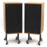 Pair of Bowers & Wilkins floor standing speakers with stands, serial numbers 20083A and 20084B, each
