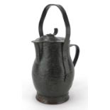 Arts & Crafts copper jug by William Souter, impressed marks to the base, 31cm high : For further