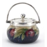 Moorcroft Wysteria pattern pottery preserve jar with silver plated mounts and swing handle, 7.5cm