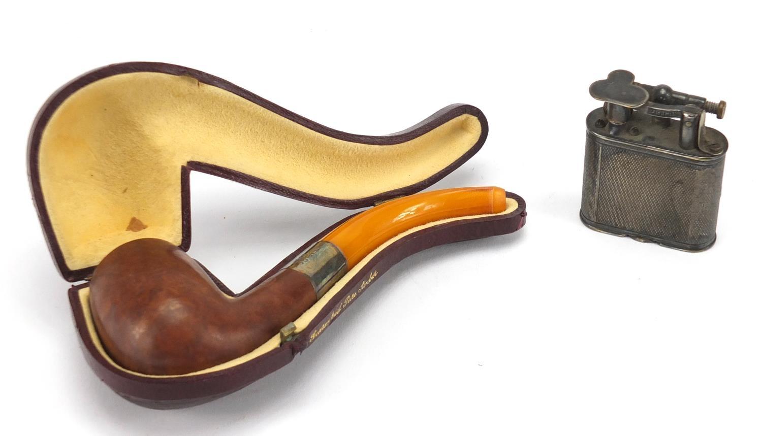 SCB pipe with amber mouth piece and silver collar, together with a silver plated Dunhill pocket