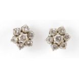Pair of 9ct gold diamond flower head earring, 7mm in diameter, approximate weight 2.3g : For further