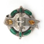 Scottish unmarked silver buckle brooch, set with citrine and malachite, 4.5cm in diameter,