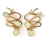 Pair of designer 18ct gold opal and diamond clip earrings, housed in a Evert Opals Australia box,