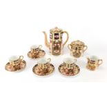 19th century Davenport Imari pattern teaware including coffee pot and lidded sugar, each hand