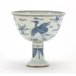 Chinese blue and white porcelain stem cup, hand painted with birds of Paradise amongst clouds,