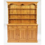 Pine dresser fitted with an open plate rack above cupboard doors and drawers, 200cm H x 153cm W x