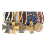 German Military interest medal group including four crosses, one with swords : For extra condition