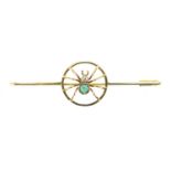 14ct gold spider bar brooch, set with an emerald and diamond, housed in a Bentley Bros tooled