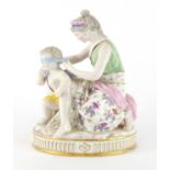 19th century Meissen porcelain figure group 'Love is Blind', blue cross sword marks to the base,