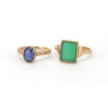 9ct gold green stone signet ring and an unmarked gold blue stone solitaire ring, size E and J,