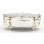 Silver footed jewel box, the hinged lid with engine turned decoration, indistinct makers mark
