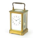 French brass cased carriage clock by Henri Jacot, with enamelled dial and Roman numerals, the back