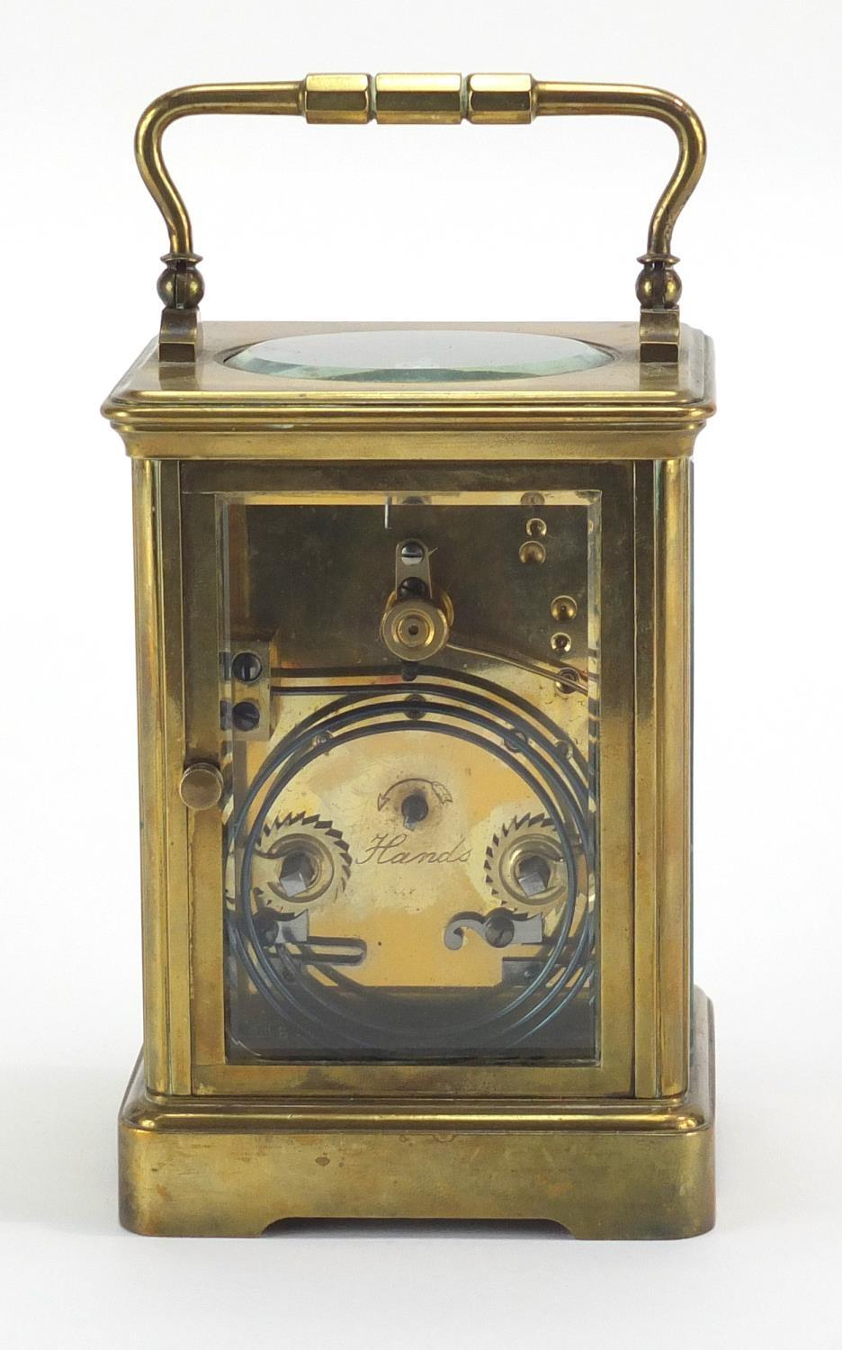 Brass cased carriage clock by Goldsmiths Company London and Paris, with enamelled dial and Roman - Image 4 of 6