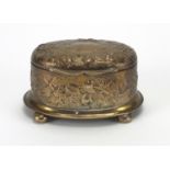 Victorian oval silver box with hinged lid, embossed with dragonflies and fruiting vines, J.A.T.S