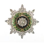 Military interest unmarked gold, diamond and enamel sweetheart wreath brooch, 2.7cm in diameter,