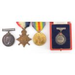 British Military World War I trio and silver Faithful Service badge, relating to H Marchant, the