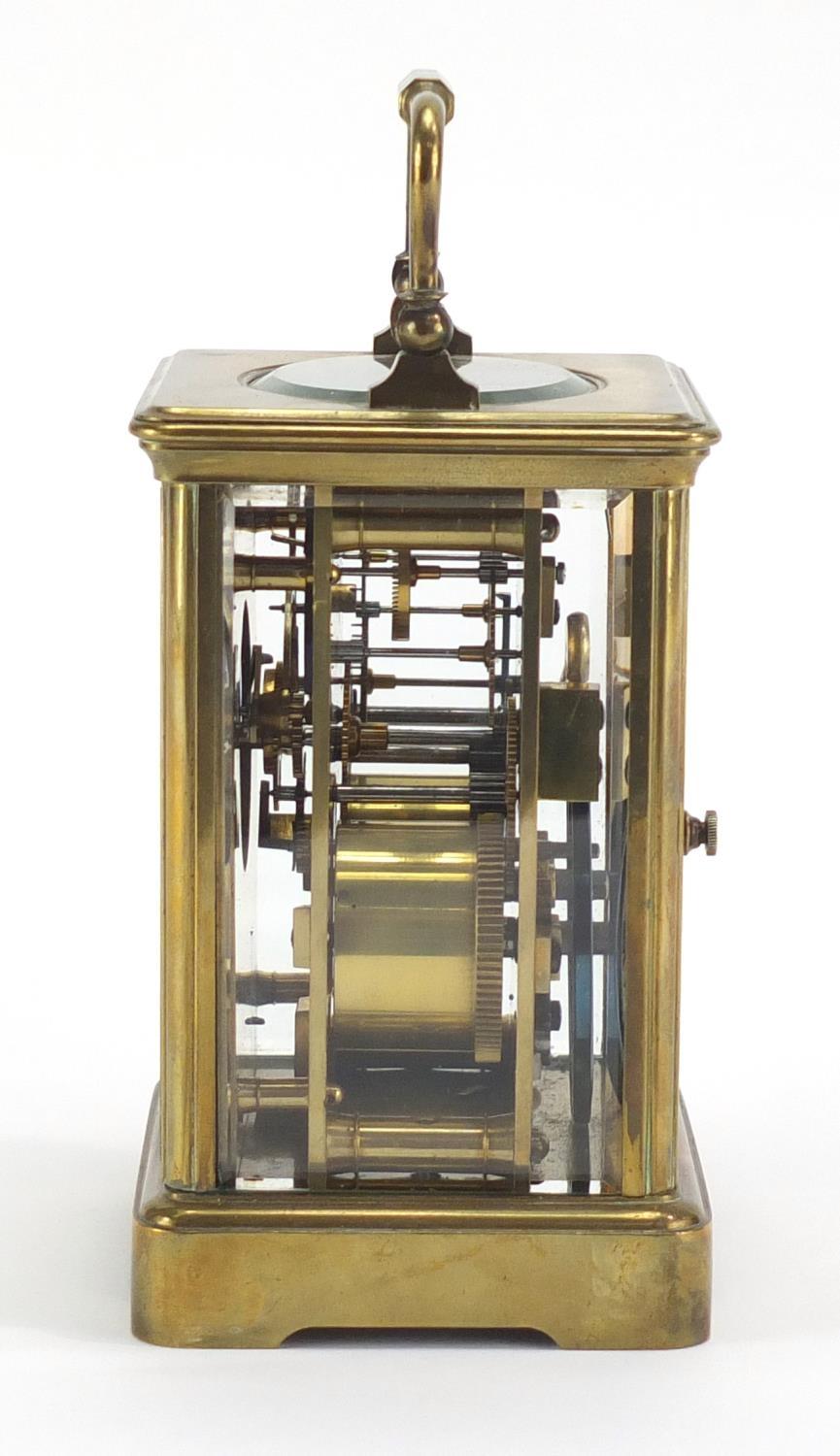 Brass cased carriage clock by Goldsmiths Company London and Paris, with enamelled dial and Roman - Image 3 of 6