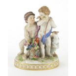 19th century Meissen hand painted porcelain putti group with parrot and goat, blue cross sword marks