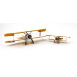 Two model biplanes, the largest 50cm in length : For extra condition reports please visit www.