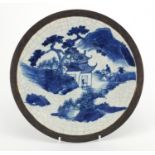 Chinese blue and white crackle glazed plate, hand painted with a figure on a horseback in a