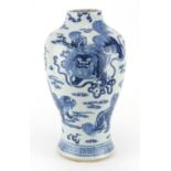 Chinese blue and white porcelain baluster vase, hand painted with Qiln lions amongst clouds, 38cm