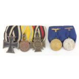 Five German Military interest medals including a cross : For extra condition reports please visit