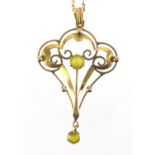 Art Nouveau 9ct gold Peridot pendant on a unmarked gold necklace, the pendant 5cm in length,