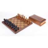 Mahogany and satinwood chess board with chess set housed in a mahogany box, the board 41cm x