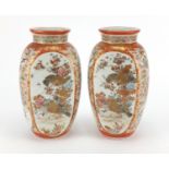 Pair of Japanese Kutani porcelain vases, hand painted with panels of birds of Paradise,