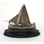 800 grade silver presentation boat, on an ebonised stand, presented by The Cashier Staff Malta