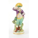 18th century hand painted Derby porcelain figure of young boy with a garland of flowers, incised