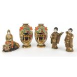 Japanese Satsuma pottery including a pair of vases and a pair of musicians, the largest 22cm