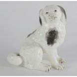 Victorian pottery seated Spaniel with out stretched legs, 10.5cm high : For extra condition